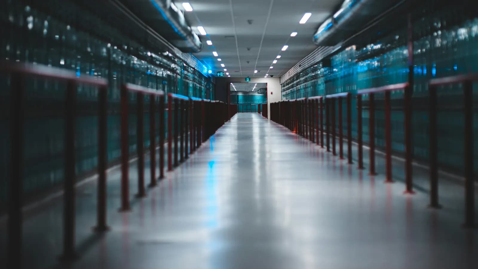 Aisle of server racks inside a cloud data centre