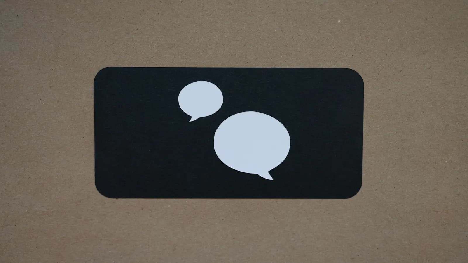 Two chat speech bubbles representing a support conversation